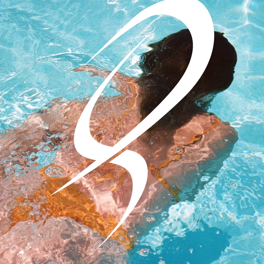 Woman swimming in the pool